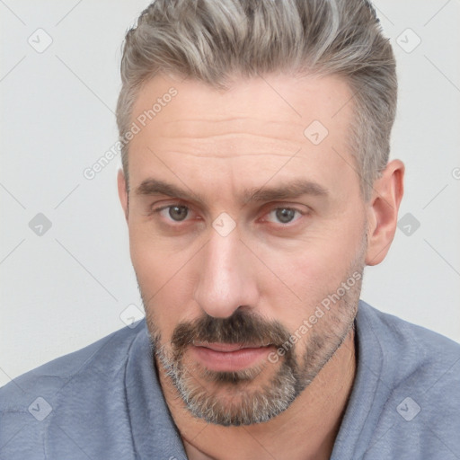 Neutral white adult male with short  brown hair and brown eyes