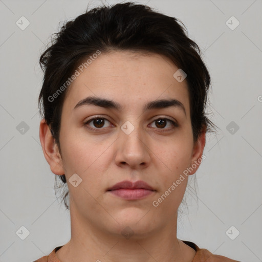 Neutral white young-adult female with short  brown hair and brown eyes