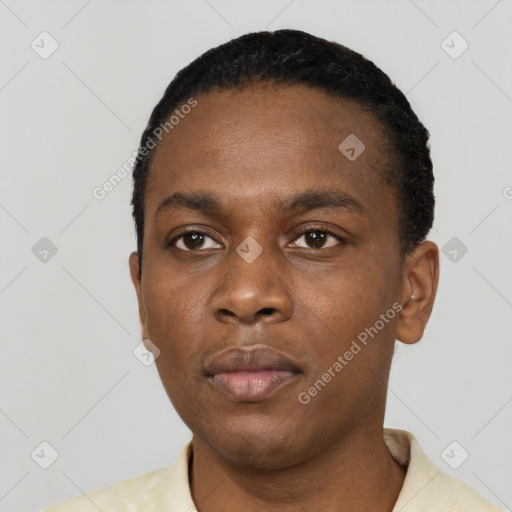 Neutral black young-adult male with short  black hair and brown eyes