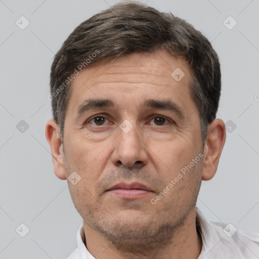 Neutral white adult male with short  brown hair and brown eyes