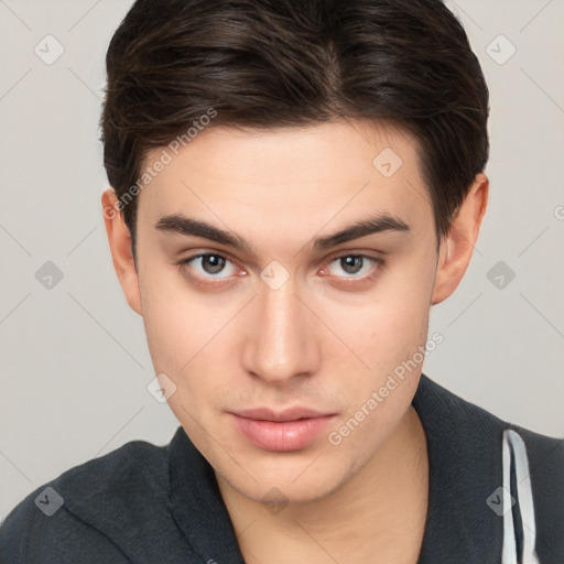 Neutral white young-adult male with short  brown hair and brown eyes