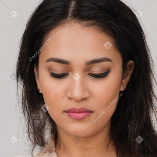 Joyful asian young-adult female with long  brown hair and brown eyes