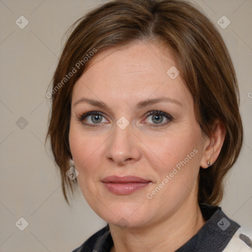 Joyful white adult female with medium  brown hair and brown eyes