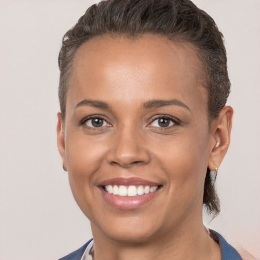 Joyful white young-adult female with short  brown hair and brown eyes