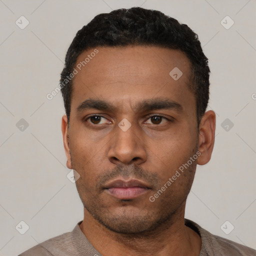 Neutral latino young-adult male with short  black hair and brown eyes