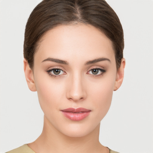 Neutral white young-adult female with short  brown hair and brown eyes