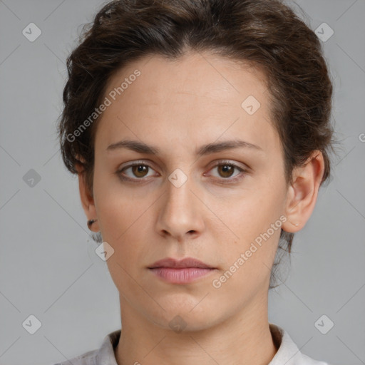 Neutral white young-adult female with short  brown hair and brown eyes