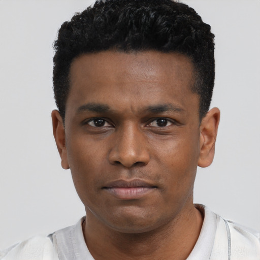 Neutral black young-adult male with short  black hair and brown eyes