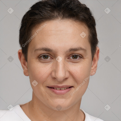 Joyful white adult female with short  brown hair and brown eyes