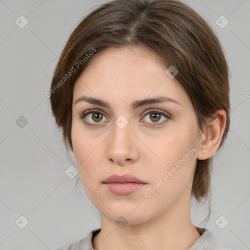 Neutral white young-adult female with medium  brown hair and brown eyes