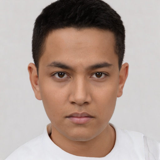 Neutral latino young-adult male with short  black hair and brown eyes