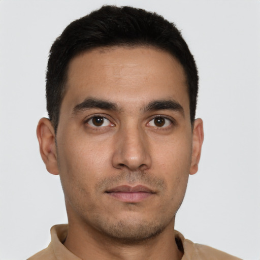 Neutral white young-adult male with short  black hair and brown eyes