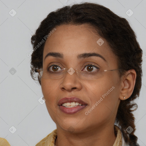 Joyful black young-adult female with medium  brown hair and brown eyes