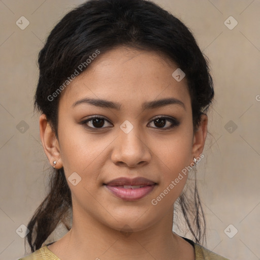 Joyful latino young-adult female with medium  brown hair and brown eyes