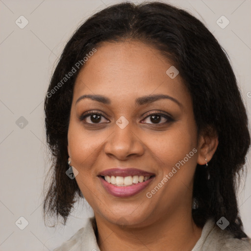 Joyful black young-adult female with medium  brown hair and brown eyes