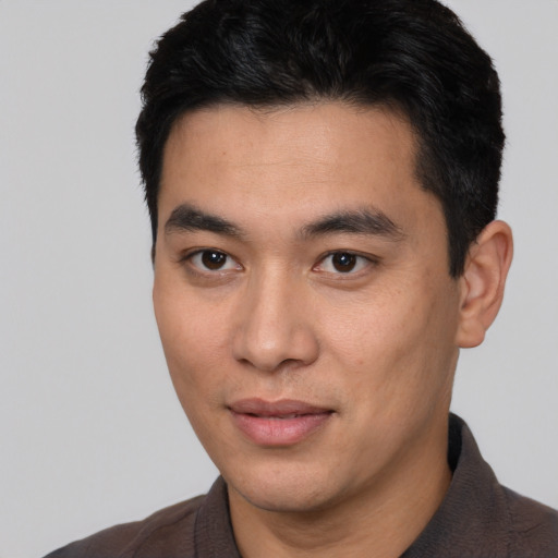 Neutral asian young-adult male with short  black hair and brown eyes