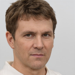 Neutral white adult male with short  brown hair and brown eyes