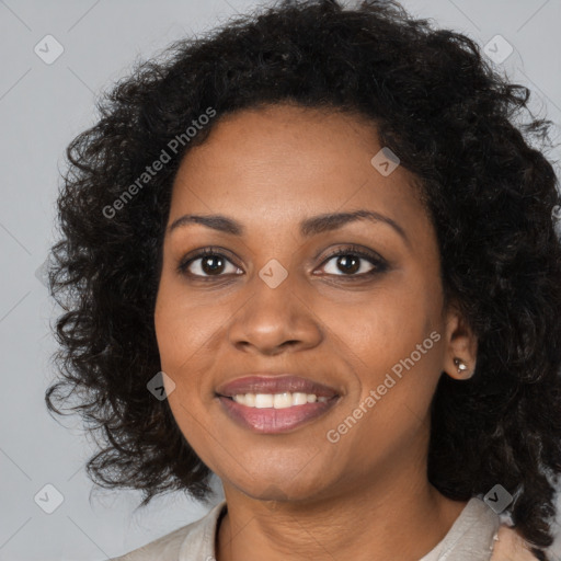 Joyful black young-adult female with medium  black hair and brown eyes