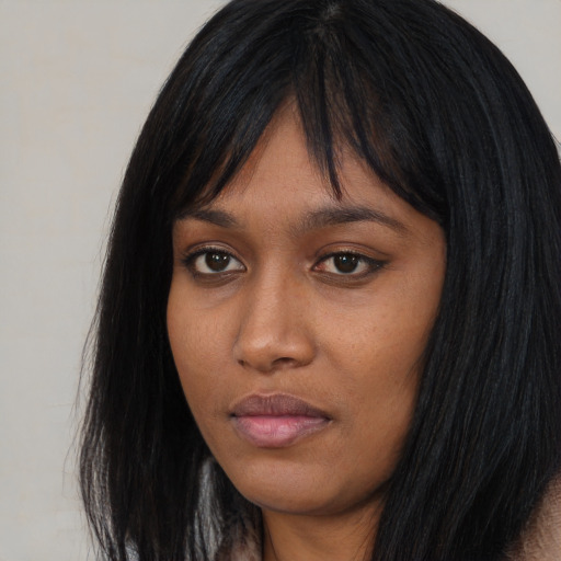 Neutral asian young-adult female with long  black hair and brown eyes