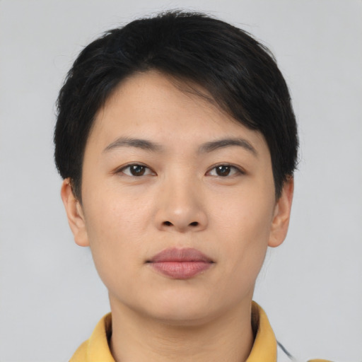 Neutral asian young-adult female with short  brown hair and brown eyes