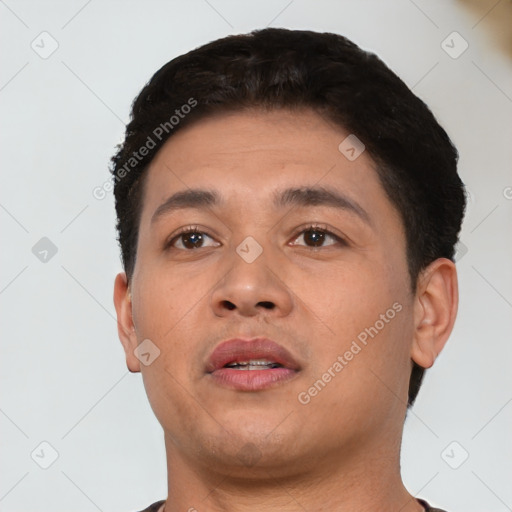 Neutral white young-adult male with short  black hair and brown eyes