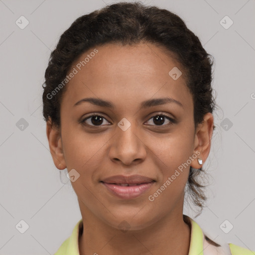 Joyful latino young-adult female with short  brown hair and brown eyes