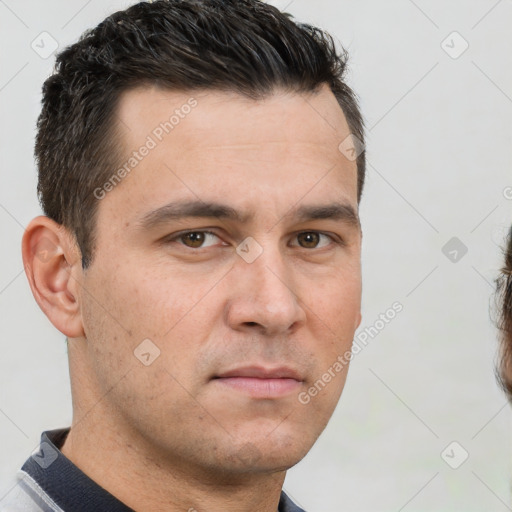 Neutral white young-adult male with short  brown hair and brown eyes