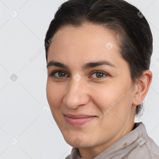 Joyful white young-adult female with short  brown hair and brown eyes