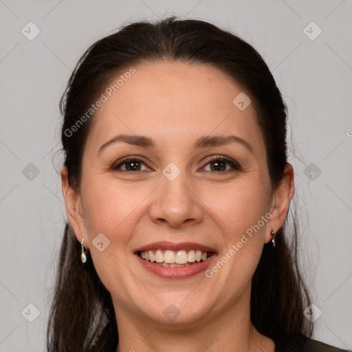 Joyful white young-adult female with long  brown hair and brown eyes