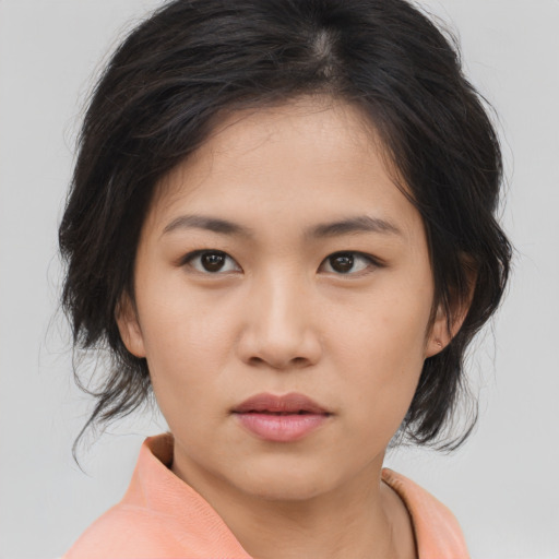 Neutral asian young-adult female with medium  brown hair and brown eyes