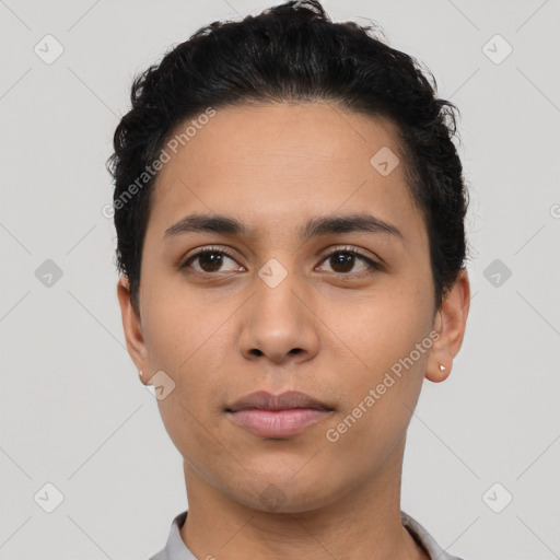 Neutral latino young-adult male with short  black hair and brown eyes