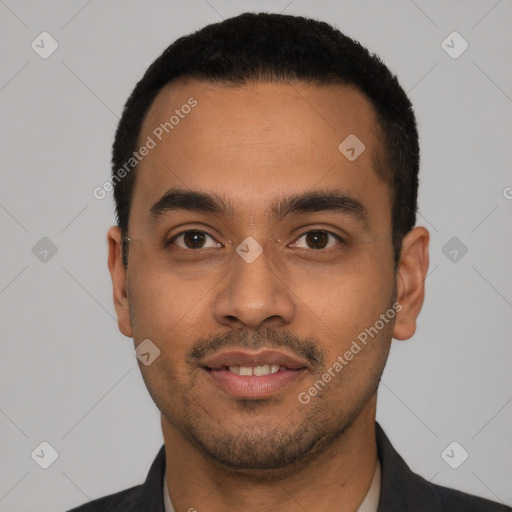 Joyful latino young-adult male with short  black hair and brown eyes