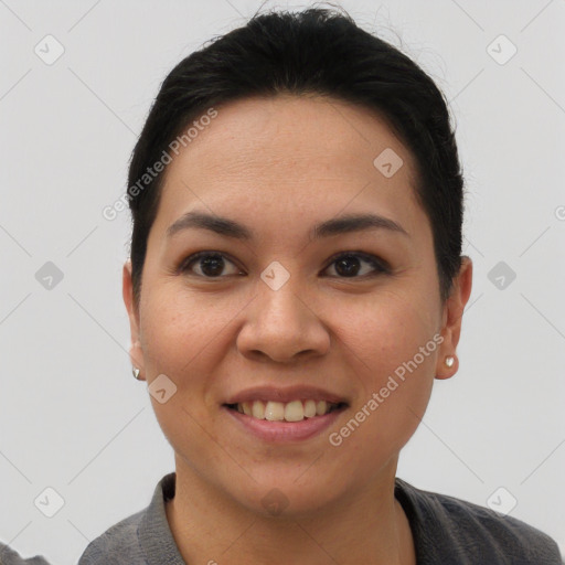 Joyful asian young-adult female with short  brown hair and brown eyes