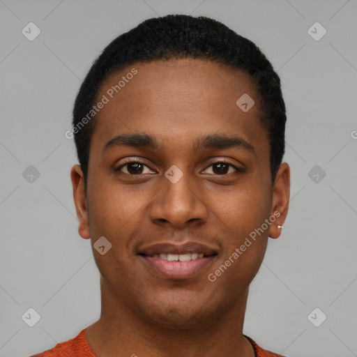 Joyful black young-adult male with short  black hair and brown eyes