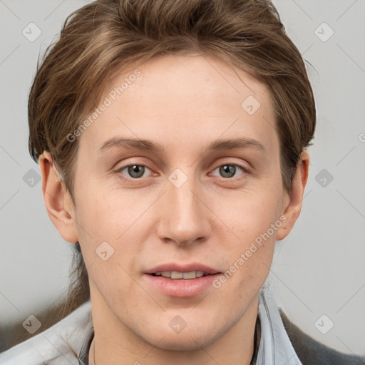 Joyful white young-adult female with short  brown hair and grey eyes