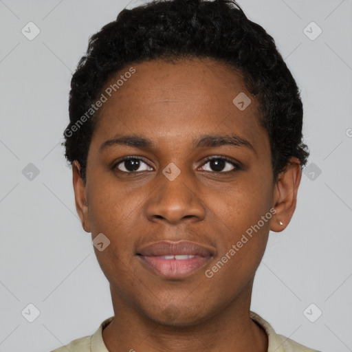 Joyful black young-adult male with short  brown hair and brown eyes