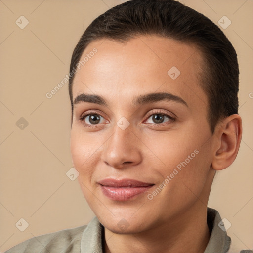 Joyful white young-adult female with short  brown hair and brown eyes