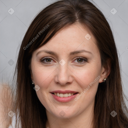 Joyful white young-adult female with long  brown hair and brown eyes