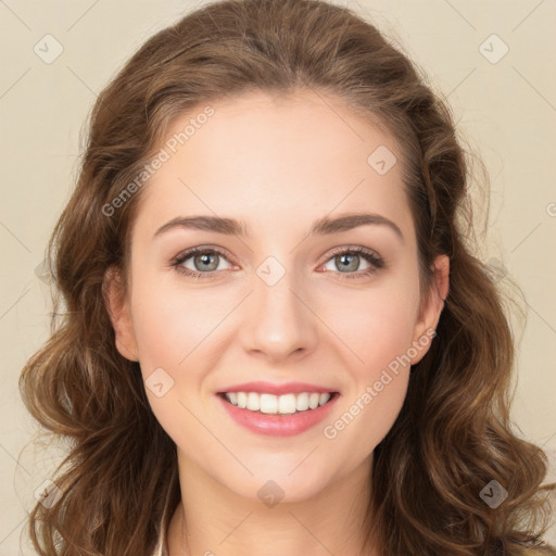 Joyful white young-adult female with long  brown hair and green eyes