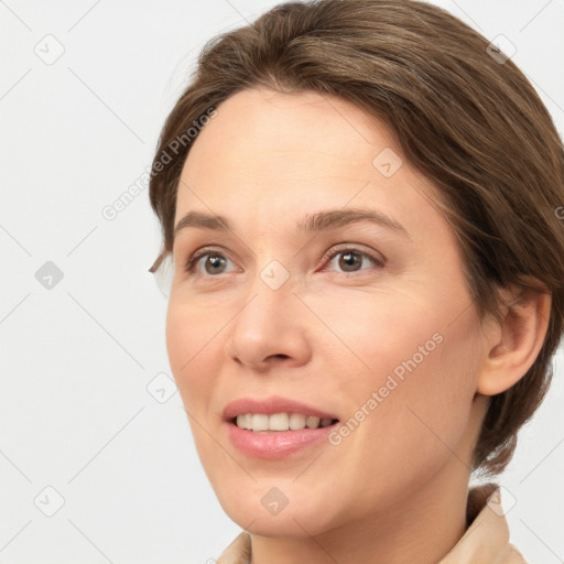 Joyful white young-adult female with medium  brown hair and grey eyes