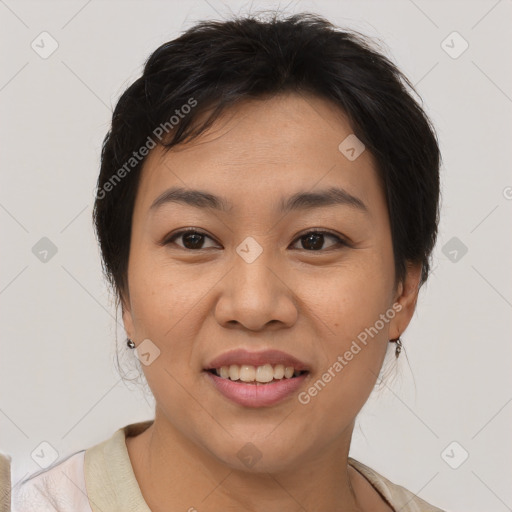 Joyful asian young-adult female with medium  brown hair and brown eyes