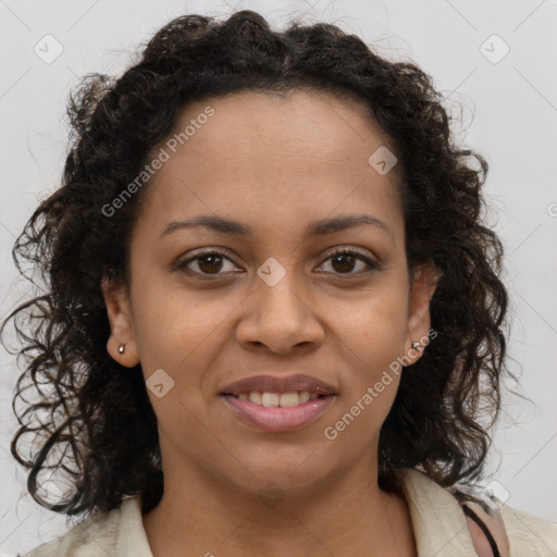 Joyful black young-adult female with long  brown hair and brown eyes