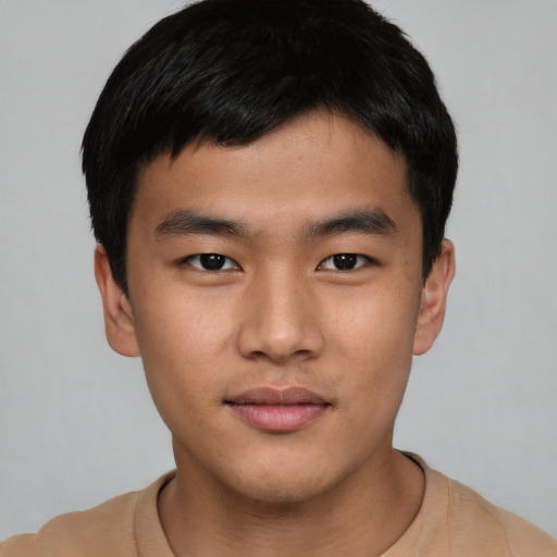 Neutral asian young-adult male with short  black hair and brown eyes
