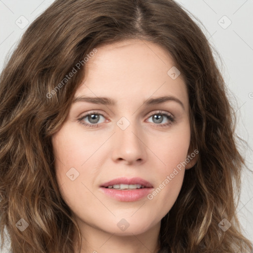 Joyful white young-adult female with long  brown hair and green eyes