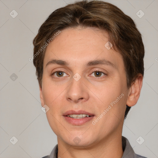 Joyful white adult female with short  brown hair and grey eyes