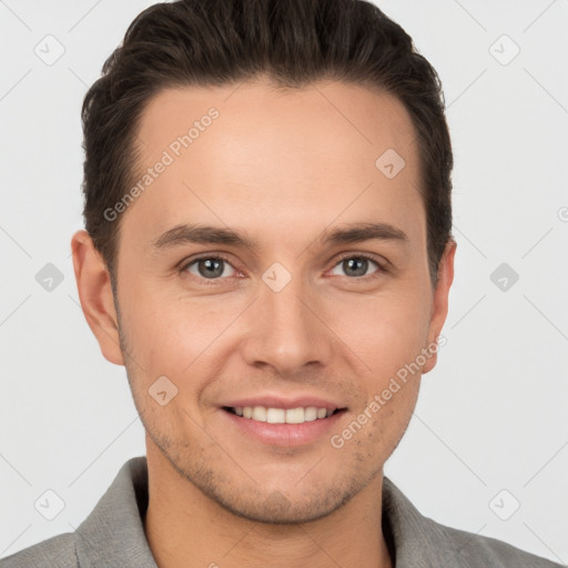 Joyful white young-adult male with short  brown hair and brown eyes