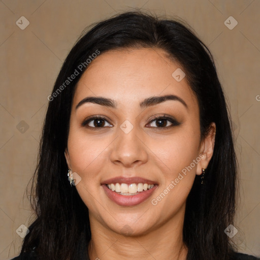 Joyful latino young-adult female with long  brown hair and brown eyes