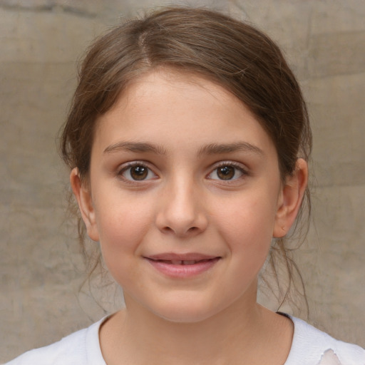 Joyful white child female with medium  brown hair and brown eyes