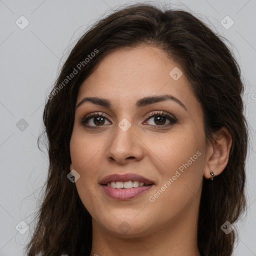 Joyful white young-adult female with long  brown hair and brown eyes