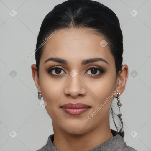 Joyful latino young-adult female with short  black hair and brown eyes